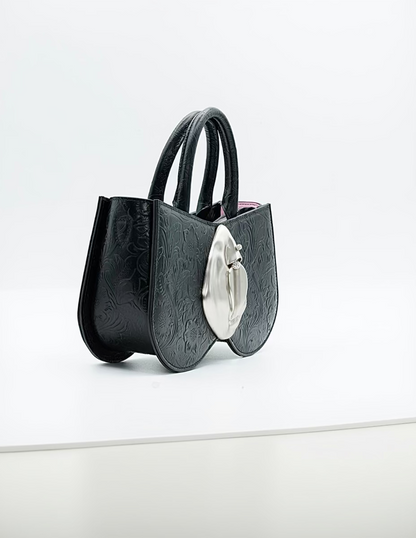 Black leather, Silver Vulva