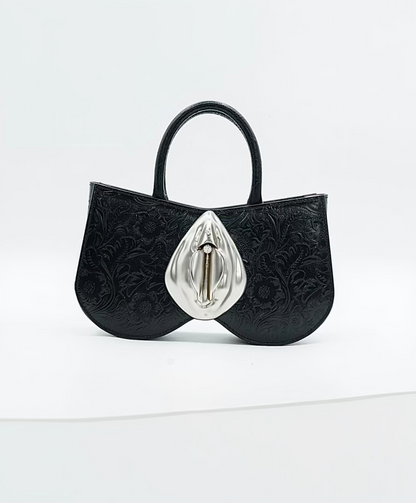 Black leather, Silver Vulva