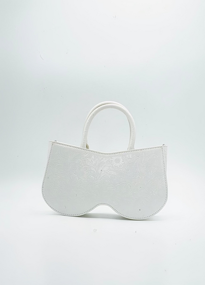 White leather, Gold Vulva