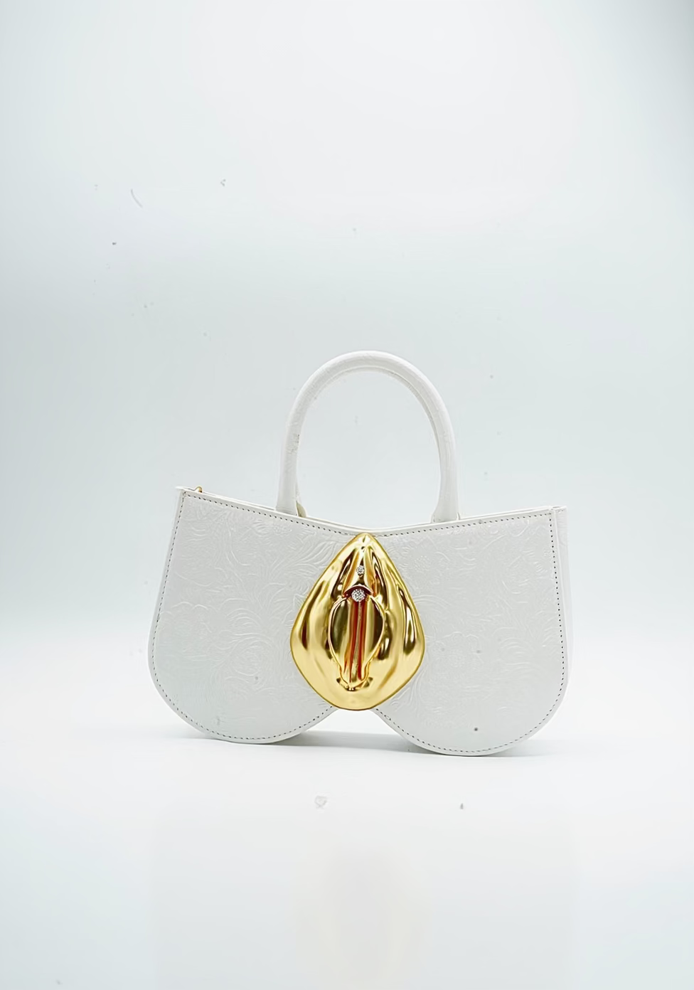 White leather, Gold Vulva